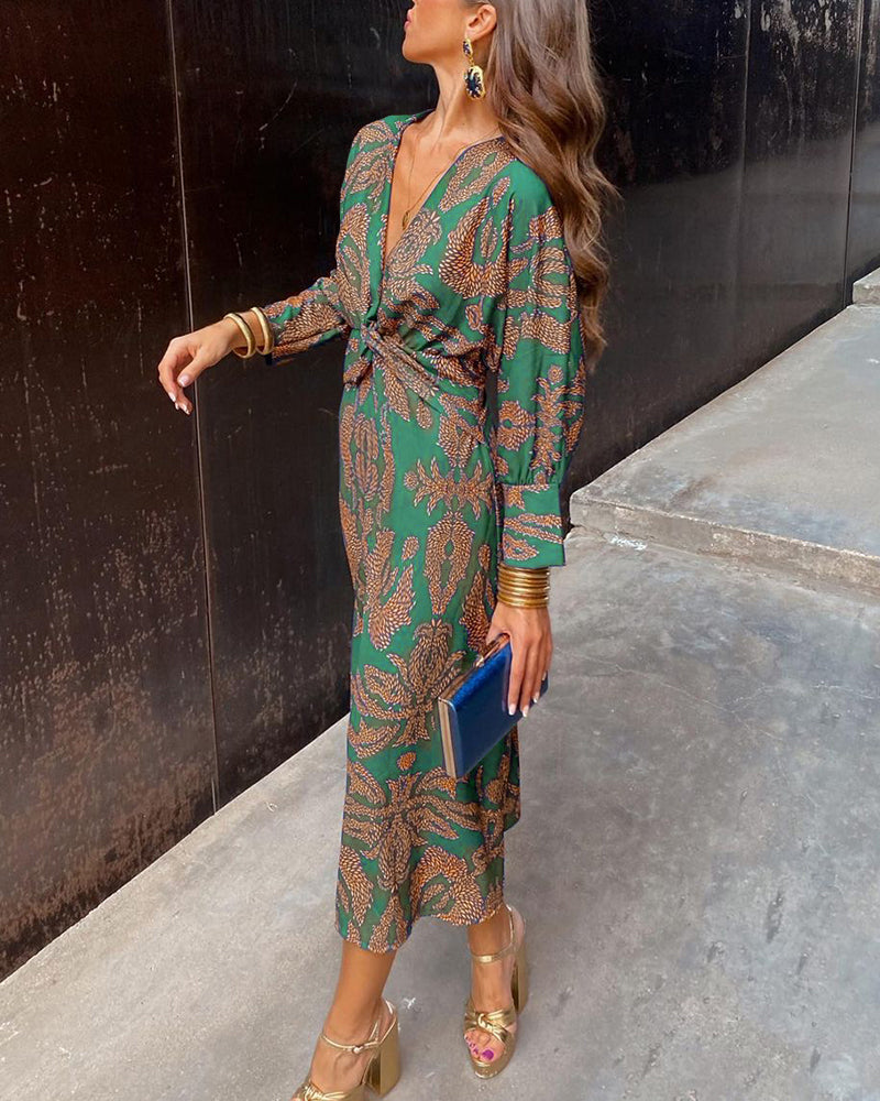 Vestido midi estampado verde con escote en V y manga larga abullonada