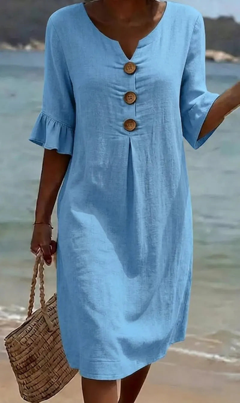 Vestido informal azul con escote en V y botones decorativos, manga globo
