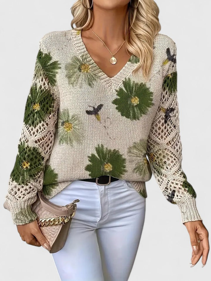 Suéter de punto crema con flores verdes y mangas caladas, estampado con aves