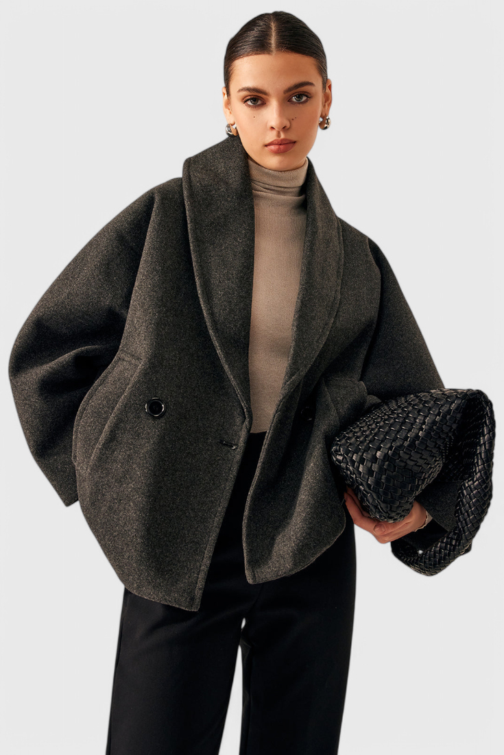 Abrigo oversize de tweed gris oscuro con solapas y cierre con botón