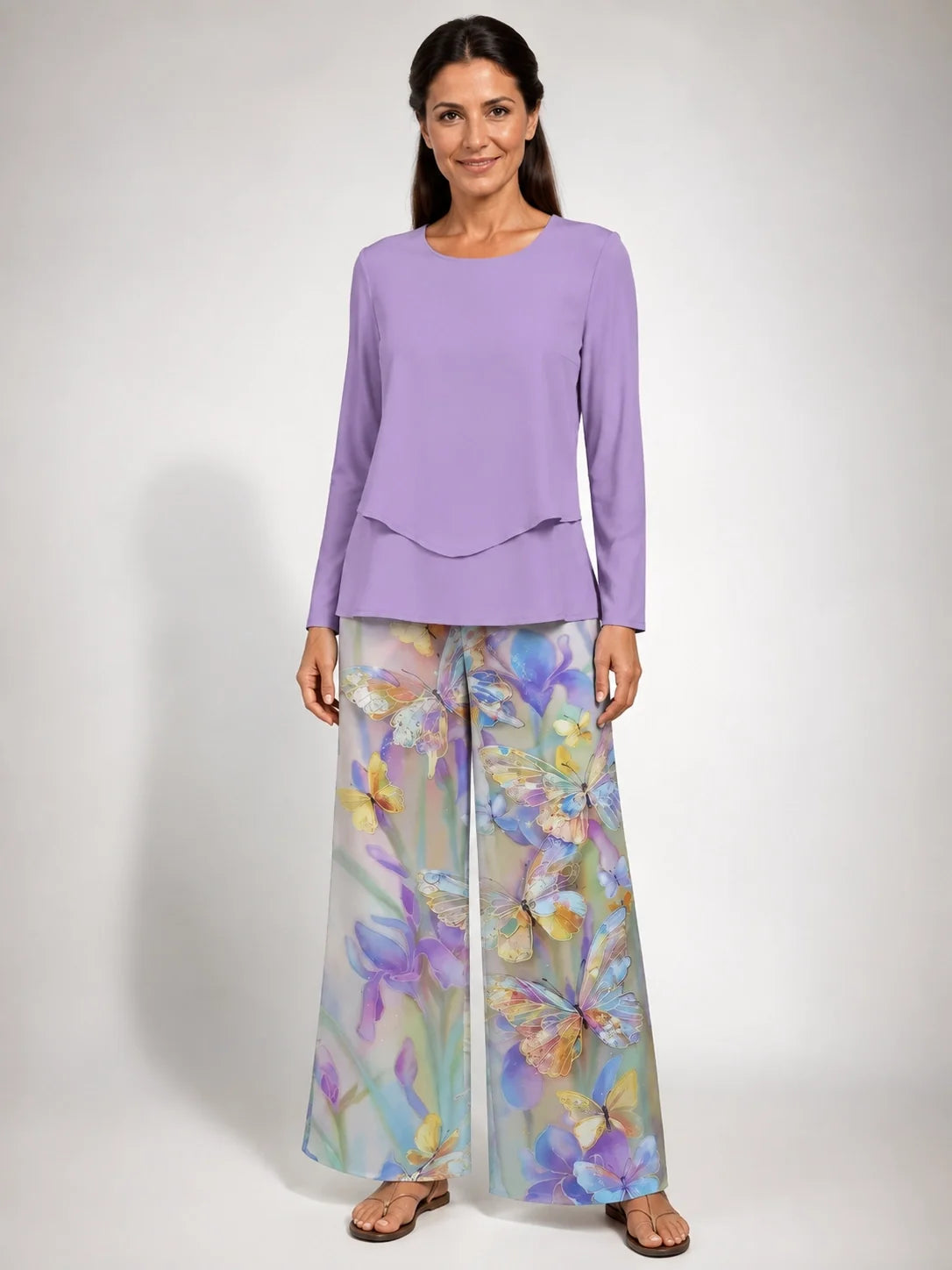 Conjunto Otilia™ lila: blusa de manga larga y faldón con pantalón ancho floral.