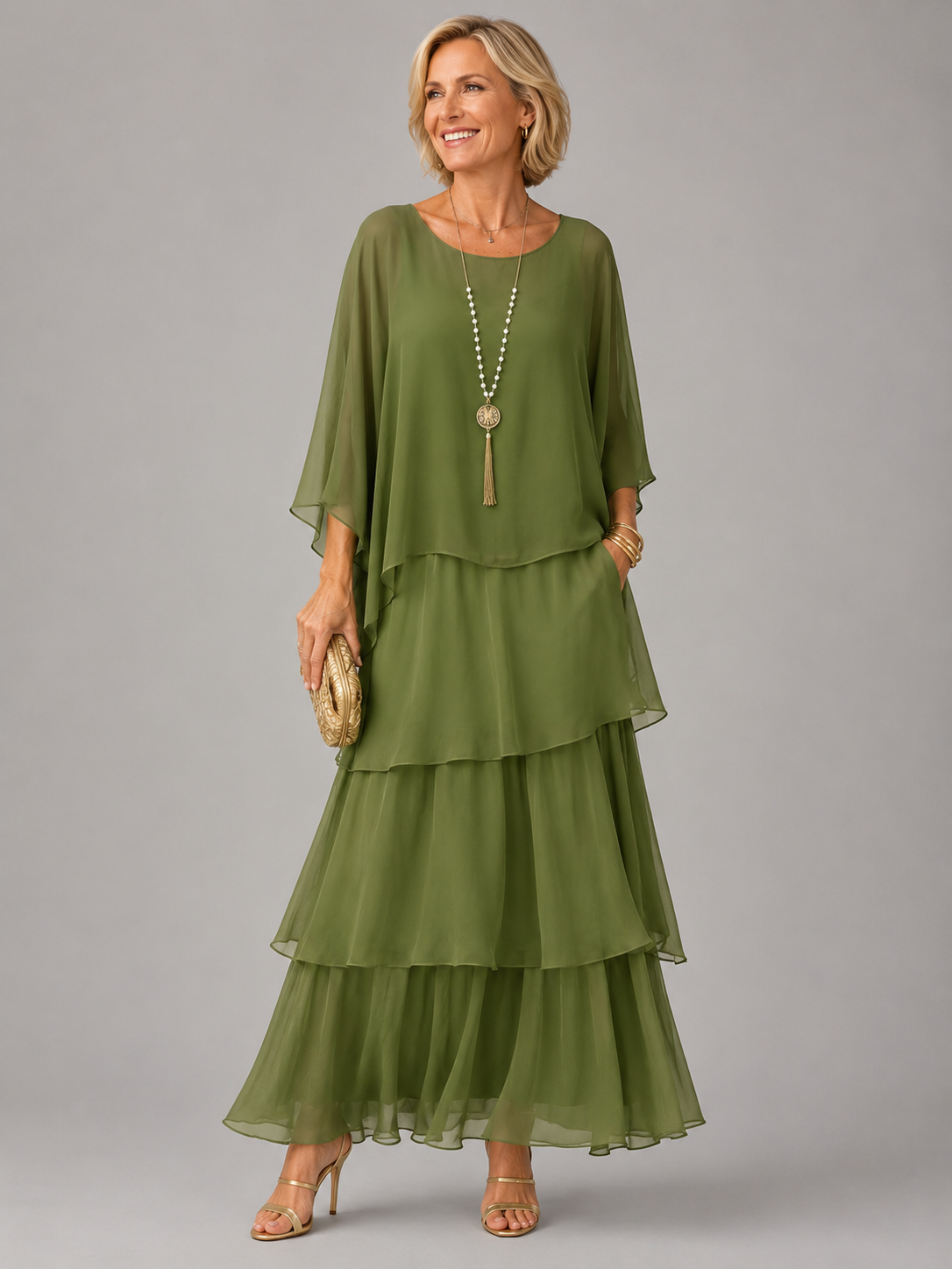 Vestido largo verde olivo fluido con volantes escalonados y mangas tipo capa