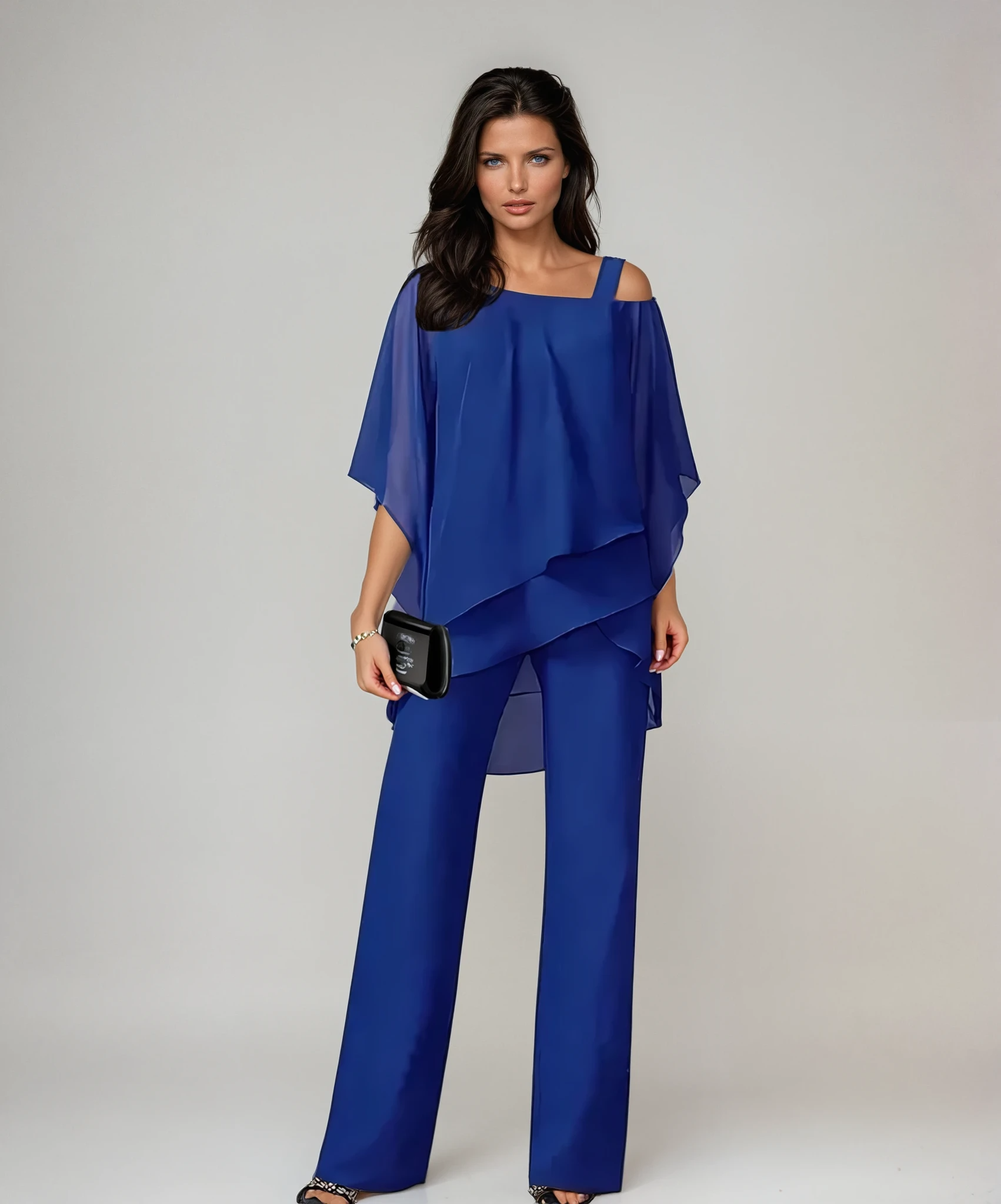 Conjunto de dos piezas azul: blusa suelta con capas y pantalón de campana