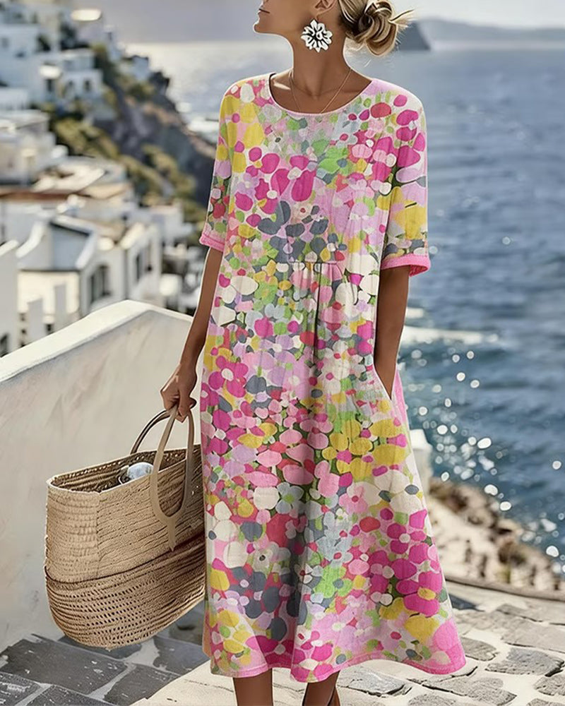 Vestido midi floral multicolor con manga corta y falda amplia tipo A.