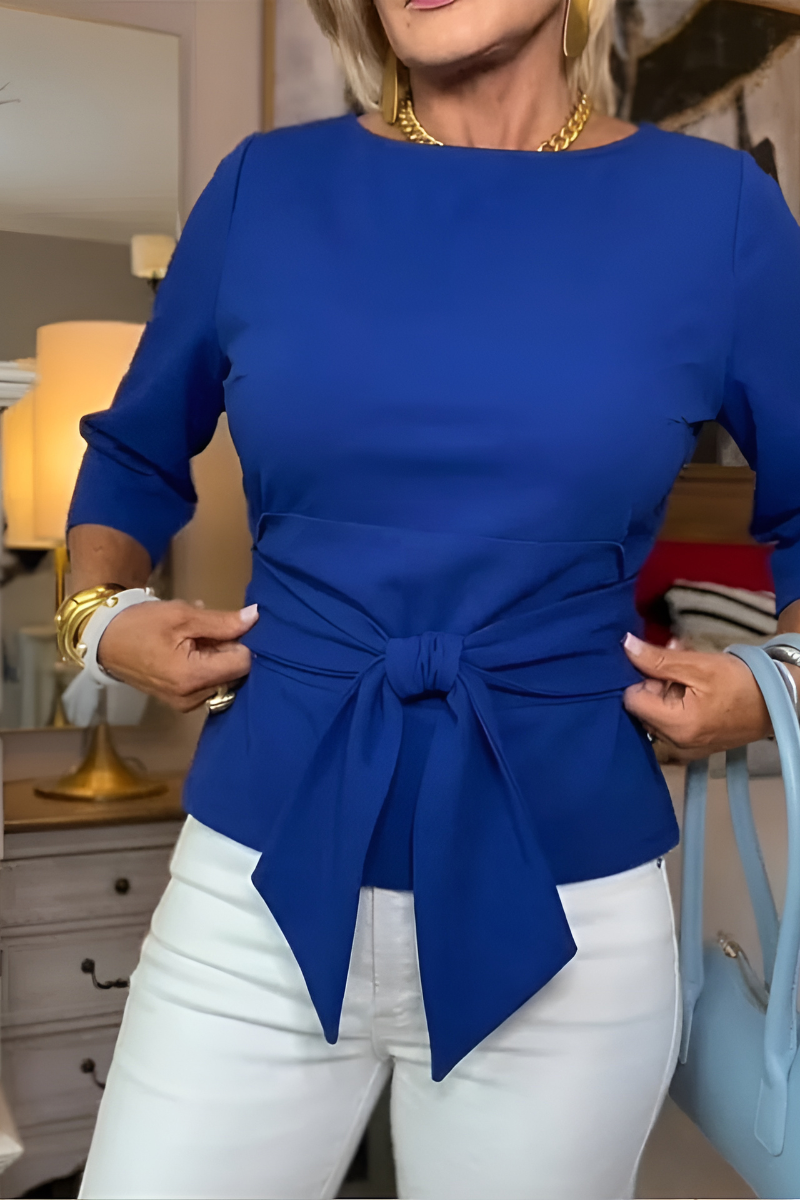 Top azul de manga 3/4 con lazo ajustable en la cintura