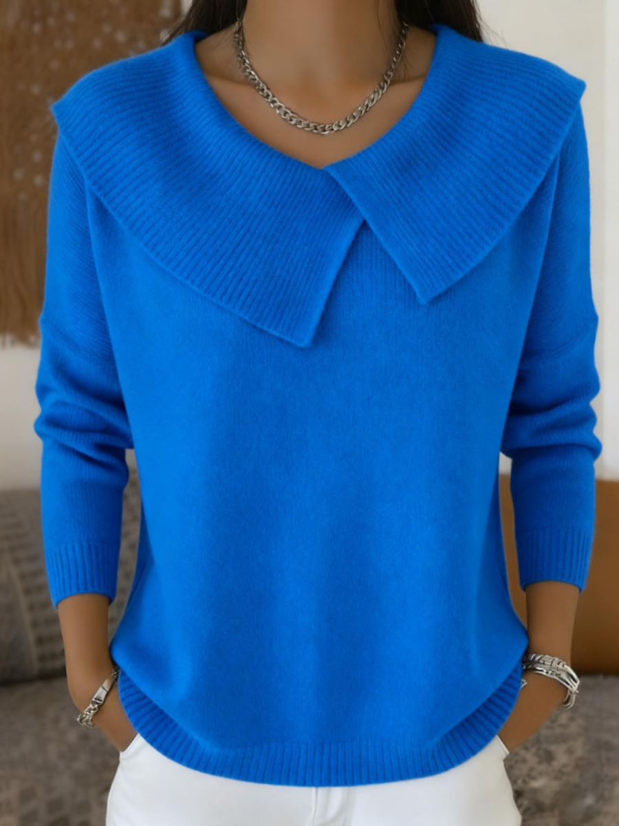 Jersey de punto azul con cuello suave tipo solapa y manga larga
