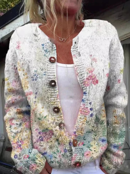 Chaqueta de punto floral clara con botones marrones y escote en V