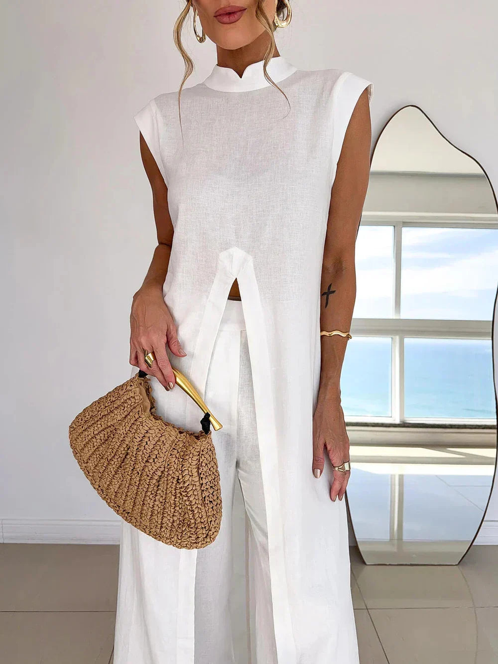 Conjunto Benigna™ blanco: túnica sin mangas con cuello alto y abertura central
