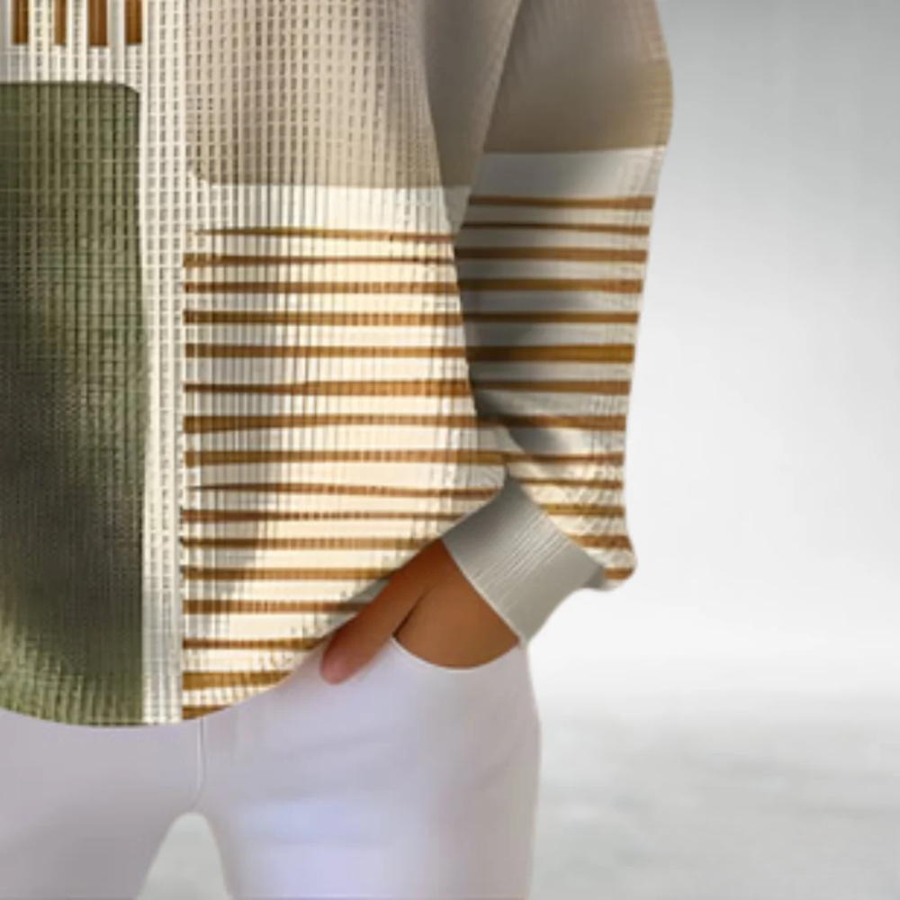 Jersey de punto con mangas a rayas y bloque verde oliva; dobladillo y costuras