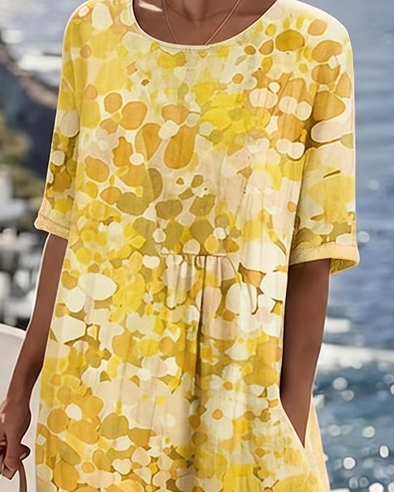 Vestido midi floral amarillo con estampado de formas; manga corta y corte A.
