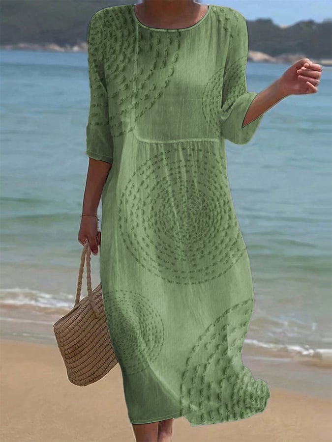 Vestido informal verde con bordado, dobladillo amplio y mangas 3/4.