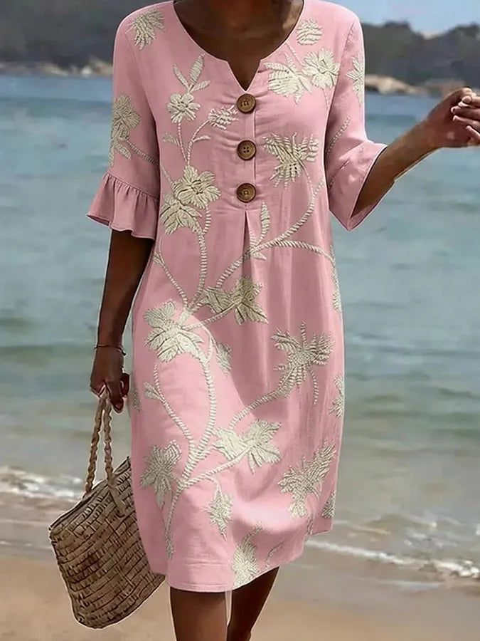 Vestido informal de mujer rosa con estampado floral y botones, manga con volante
