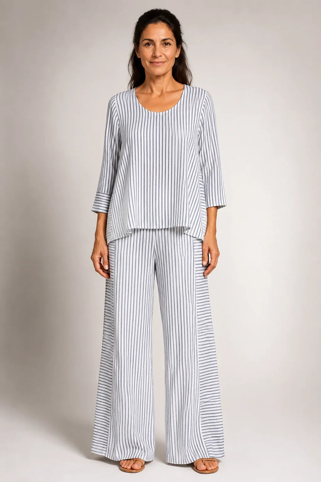 Conjunto de rayas con blusa de manga 3/4 y pantalón de pierna ancha
