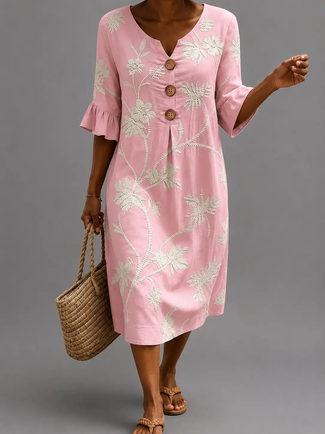 Vestido informal de mujer rosa con estampado floral, cuello en V y botones