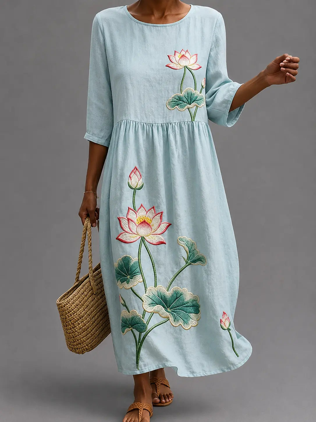 Vestido informal azul con estampado floral, manga tres cuartos y cintura fruncida