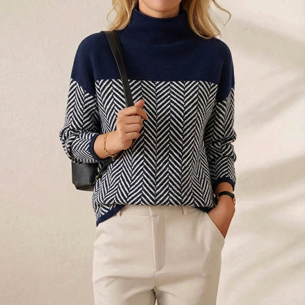 Jersey de cuello alto de algodón azul marino con franja de zigzag blanco y negro