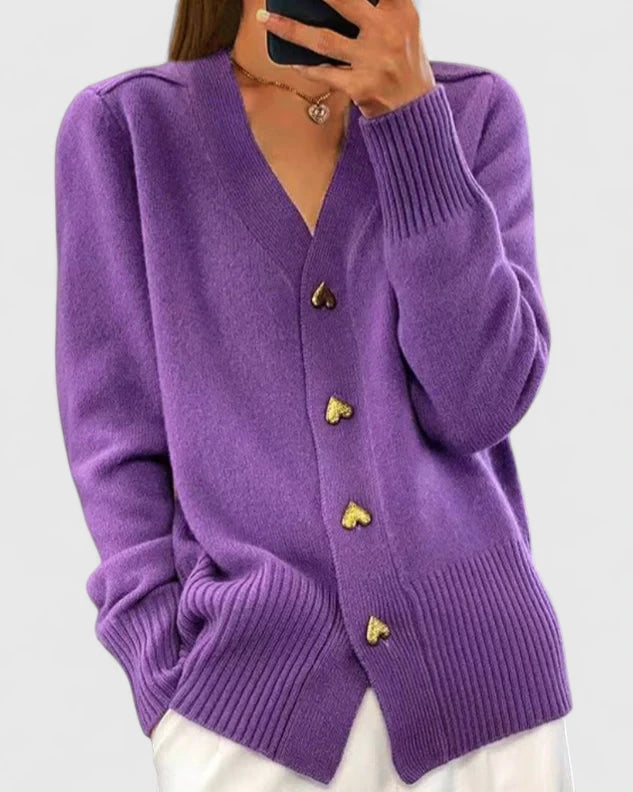 Cárdigan morado de punto con botones metálicos dorados y manga abullonada