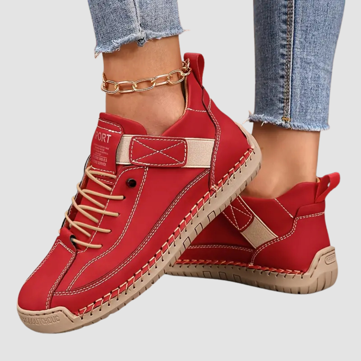 Zapatillas rojas con cordones, paneles con costuras y suela beige antideslizante