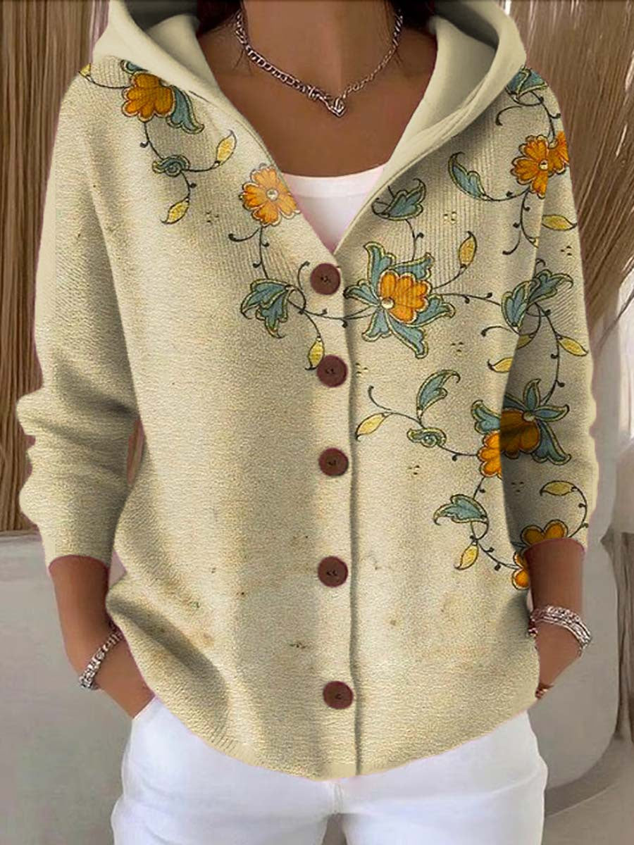 Chaleco con capucha color crema, estampado floral y botones delanteros