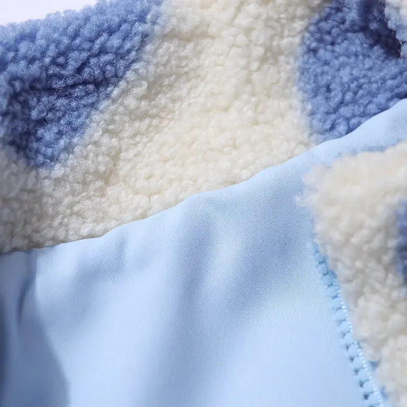Chaqueta reversible: interior azul claro liso con ribete y cremallera