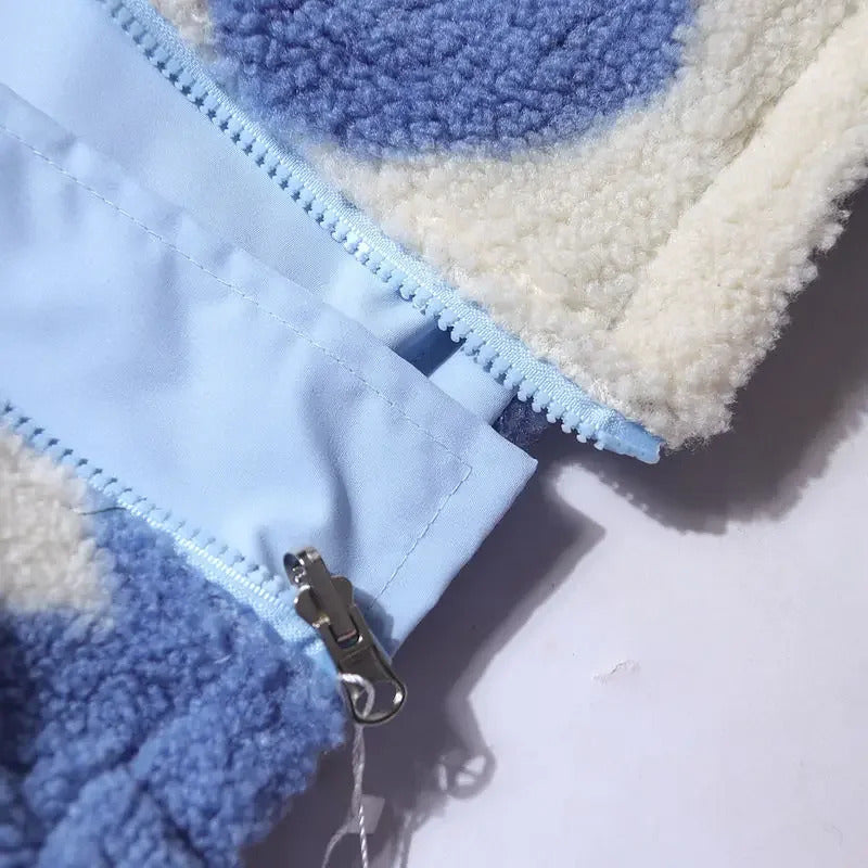 Chaqueta reversible de borrego azul y blanco, cierre con cremallera plateada