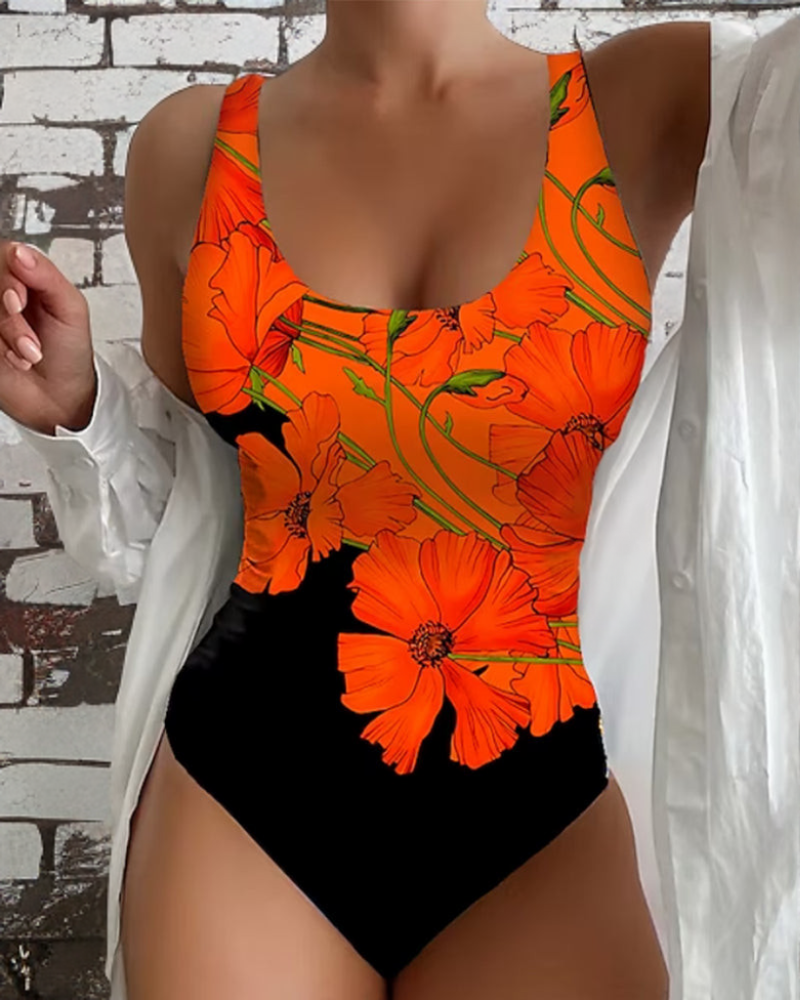 Bañador entero floral naranja con tirantes, escote pronunciado y calzón negro
