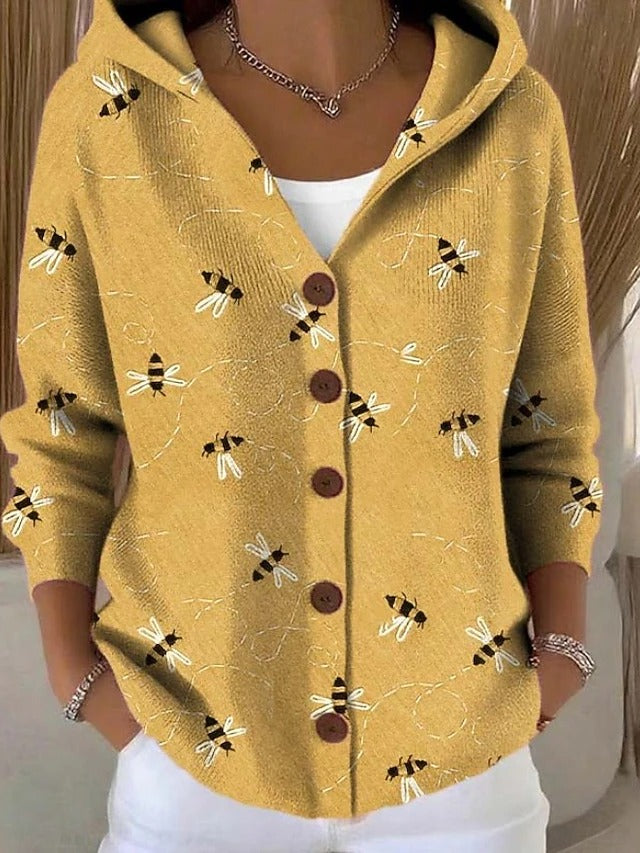 Chaleco con capucha amarillo con estampado de insectos, cierre frontal con botones marrones