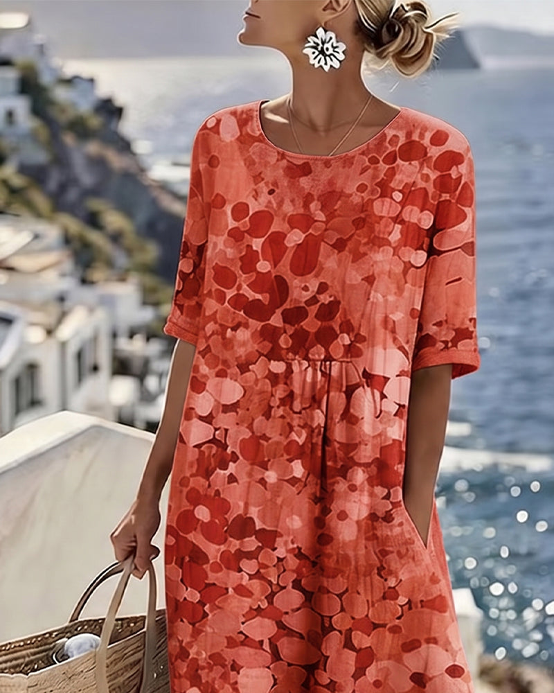 Vestido midi floral rojo, manga corta y corte A con estampado circular.