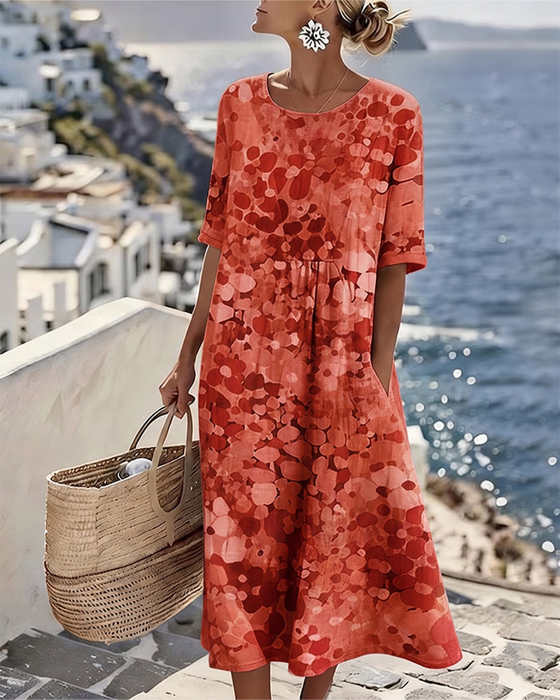 Vestido midi floral rojo, manga corta y corte A fruncido en la cintura.