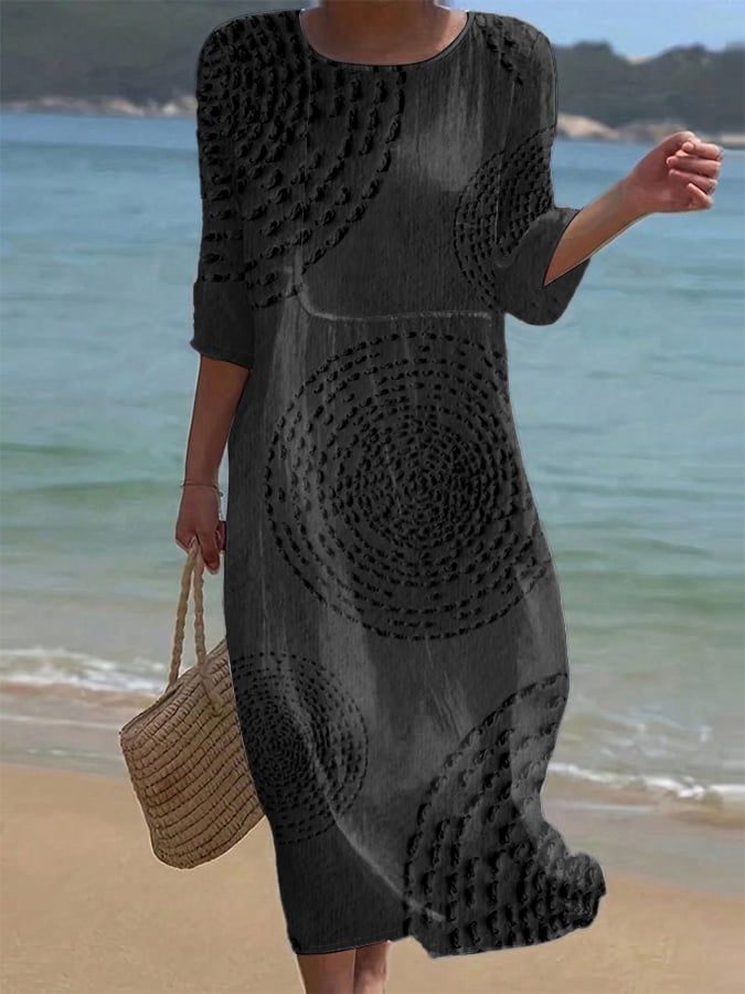 Vestido informal bordado negro, manga 3/4, cuello redondo y patrón circular en el frente