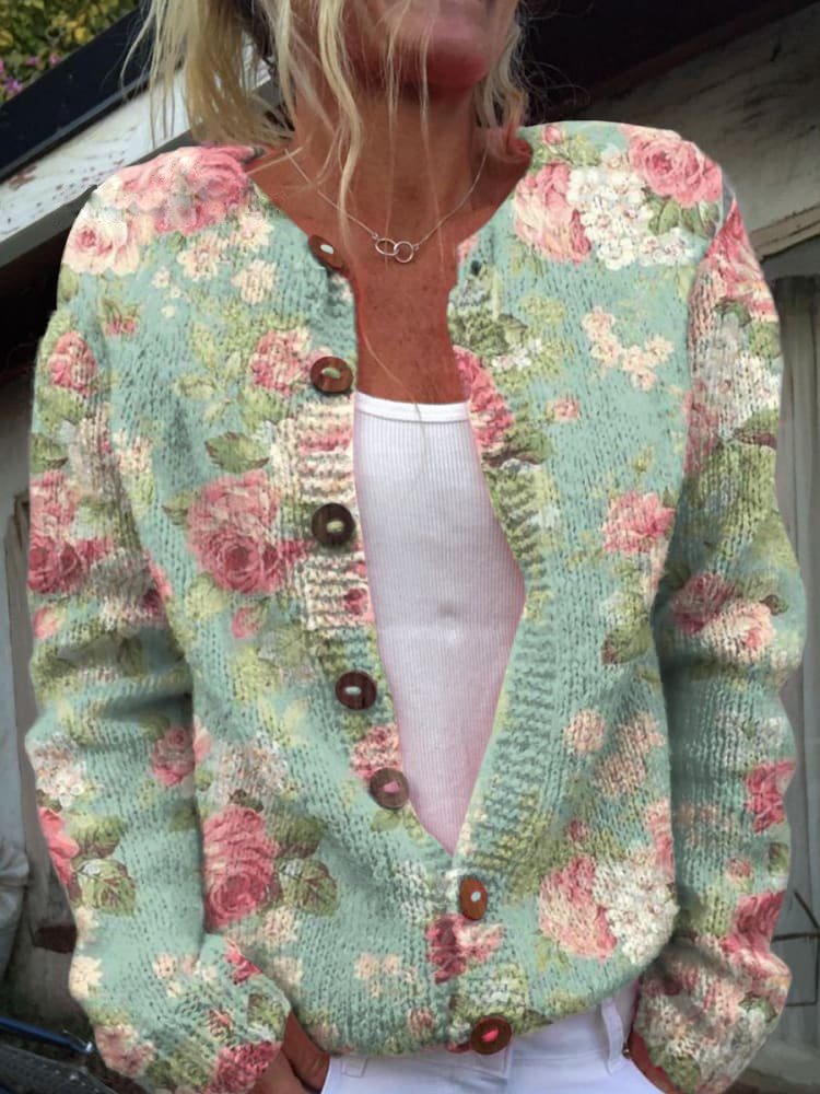 Chaqueta de punto floral azul verdoso con botones marrones y escote en V