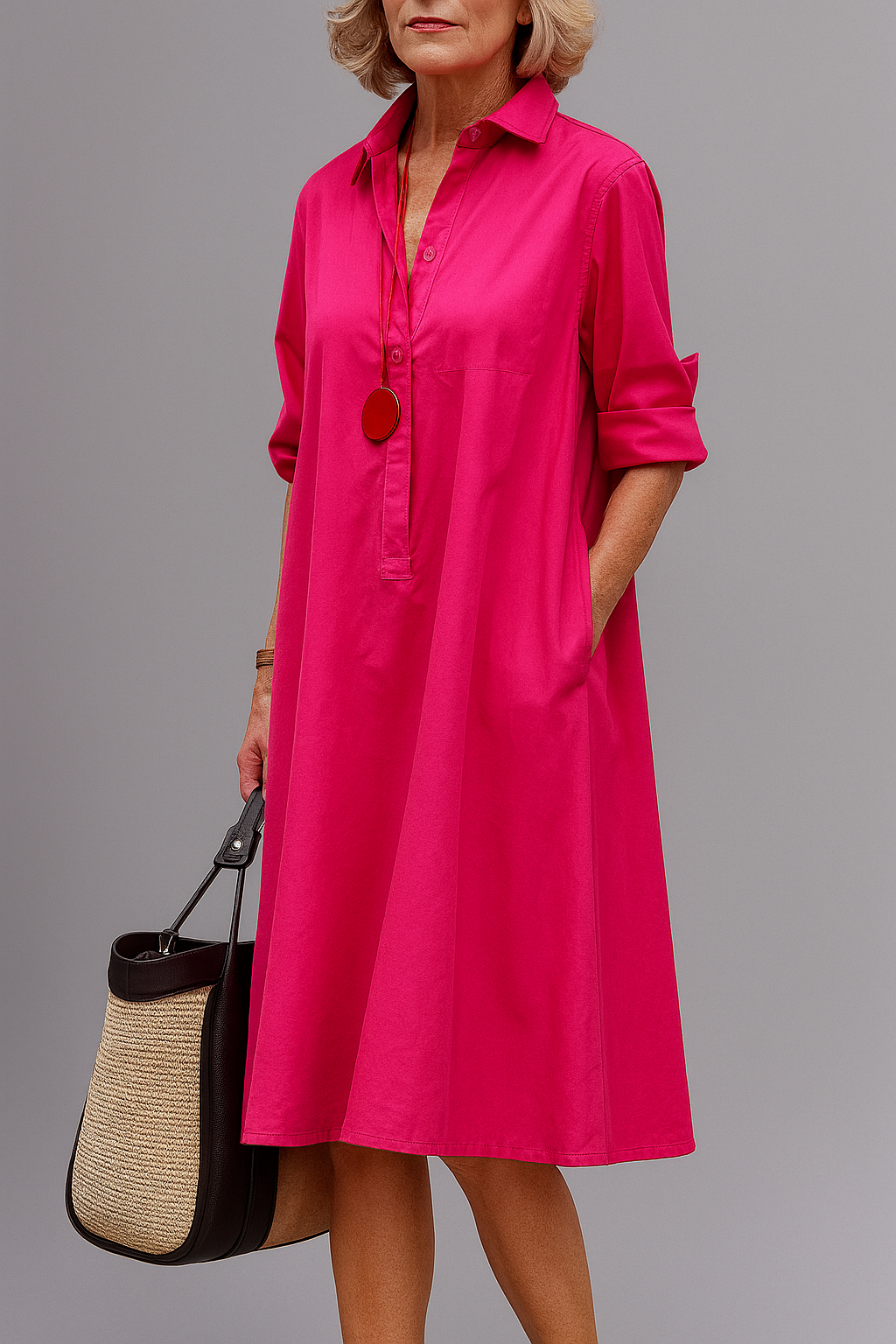 Vestido midi fucsia con botones, cuello camisero y manga 3/4