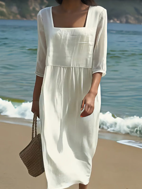 Vestido informal blanco con escote cuadrado, mangas 3/4 y falda amplia