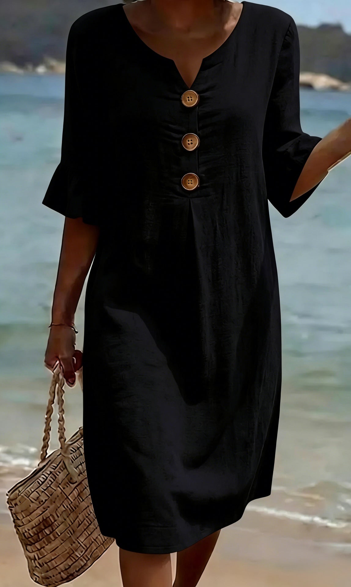 Vestido informal negro con cuello V y botones frontales, manga corta, largo midi