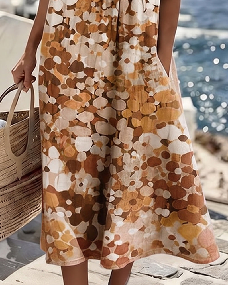 Vestido midi floral beige con marrón; falda amplia y estampado de círculos grandes.