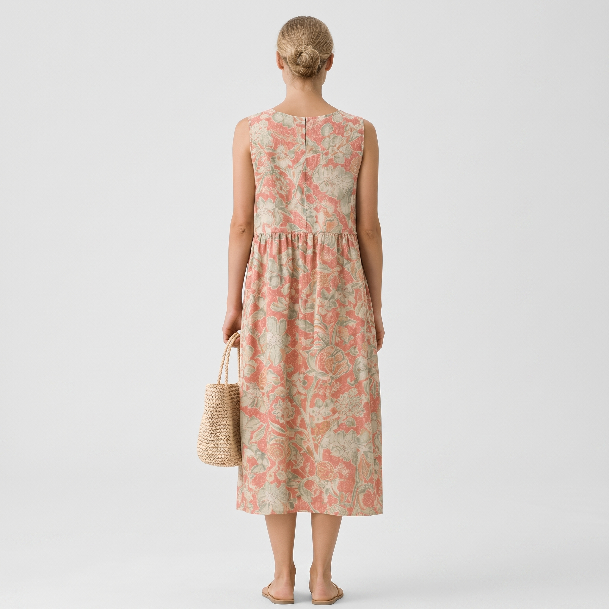 Vestido midi sin mangas estampado floral coral y verde, vista trasera de caída suelta
