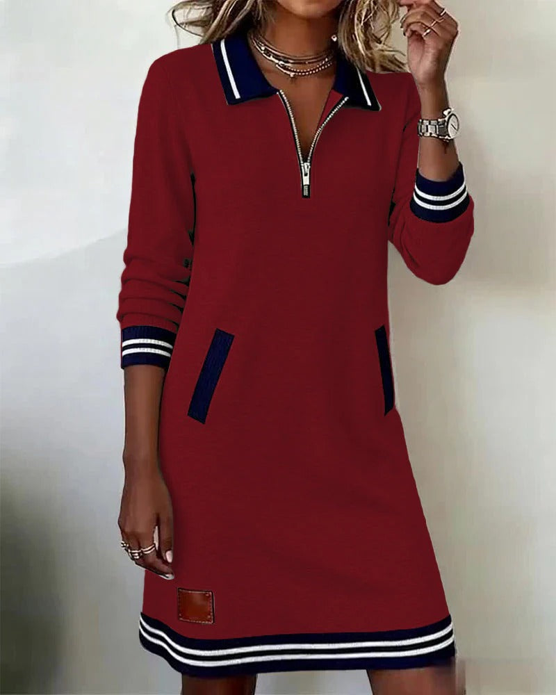 Vestido de algodón rojo con cremallera, cuello polo, puños a rayas y parche marrón