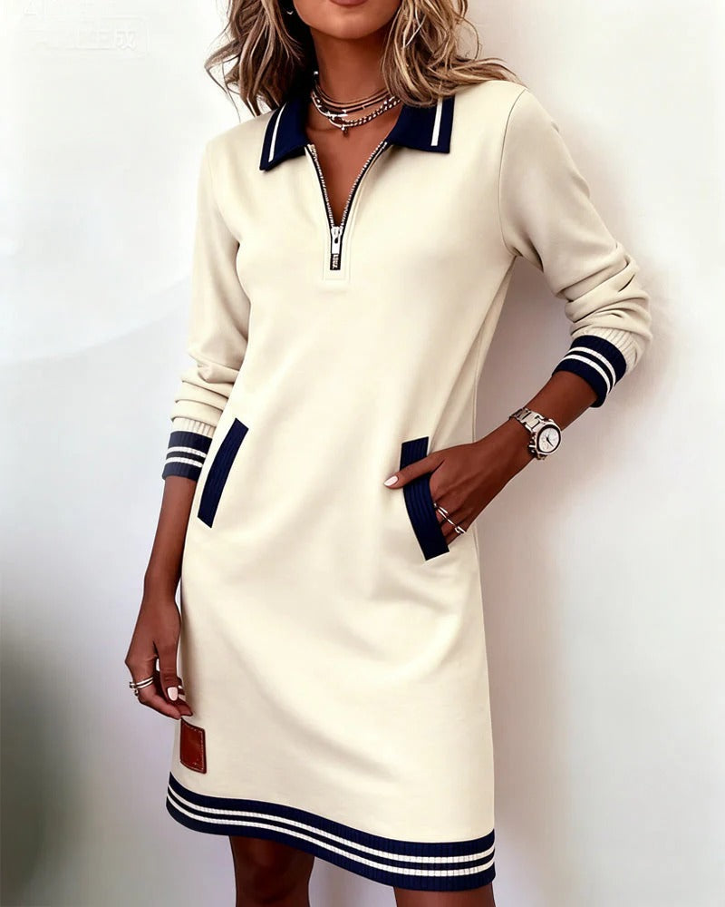 Vestido de algodón crema con cremallera, manga larga y bajo a rayas marinas
