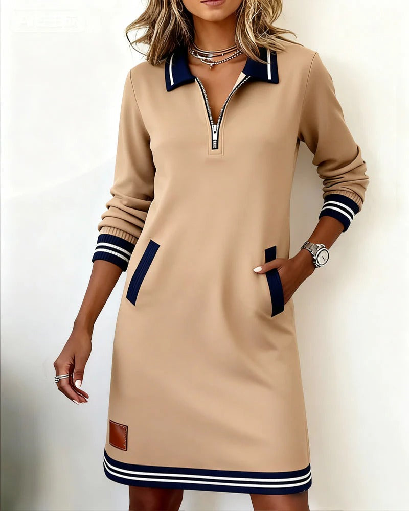 Vestido de algodón beige con cremallera, bolsillo lateral y puños a rayas