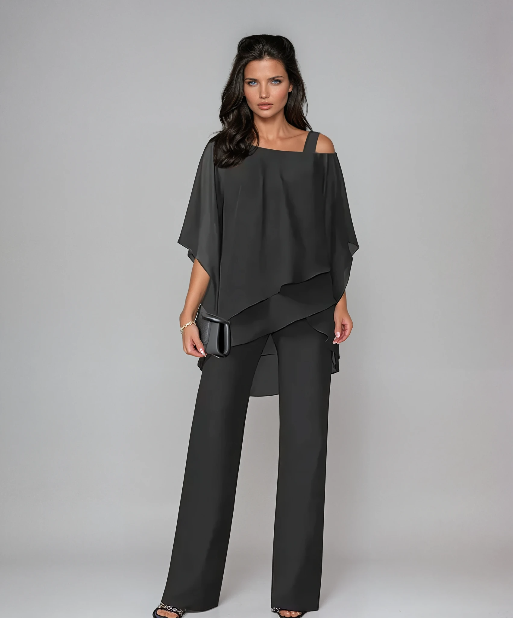 Conjunto de dos piezas negro: blusa con hombros descubiertos en capas y pantalón ancho