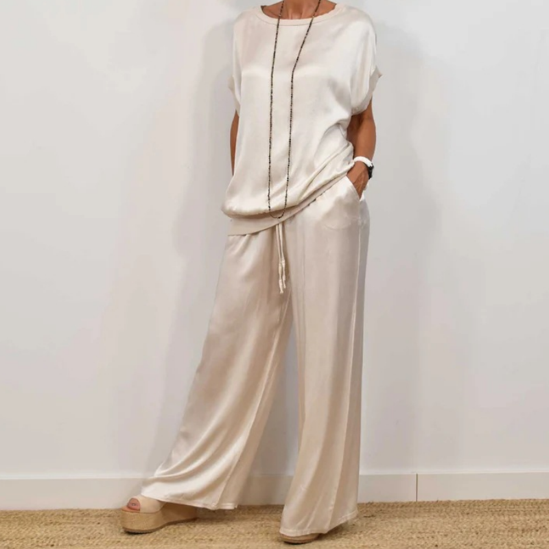 Conjunto de dos piezas blanco: blusa de manga corta y pantalón de pernera ancha